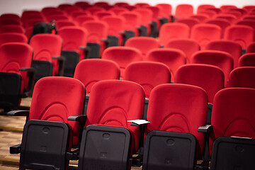 Image showing hall with rows of red seats