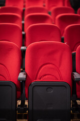 Image showing hall with rows of red seats