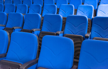 Image showing hall with rows of blue seats