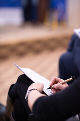 Image showing business people taking notes