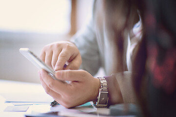 Image showing business people hands using smart phone