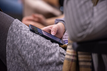 Image showing business people hands using smart phone