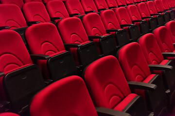 Image showing hall with rows of red seats