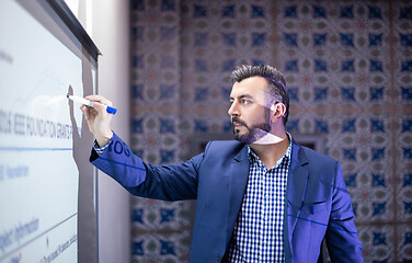 Image showing businessman giving presentations at conference room