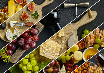 Image showing Top view of tasty cheese plate with fruit on the black stone