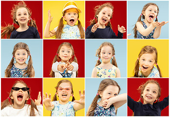 Image showing Beautiful emotional little girls isolated on multicolored background