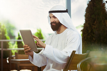 Image showing Arabian saudi businessman working outdoors