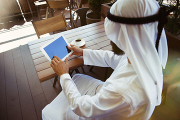 Image showing Arabian saudi businessman working outdoors