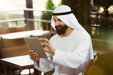 Image showing Arabian saudi businessman working outdoors