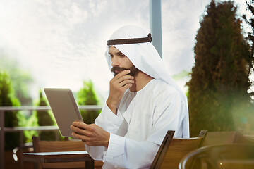 Image showing Arabian saudi businessman working outdoors