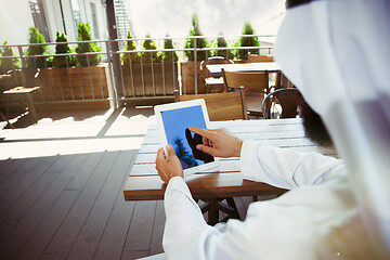 Image showing Arabian saudi businessman working outdoors