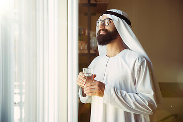 Image showing Arabian saudi businessman working in office