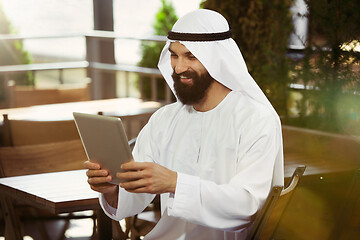 Image showing Arabian saudi businessman working outdoors