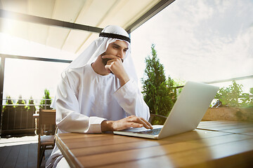 Image showing Arabian saudi businessman working outdoors