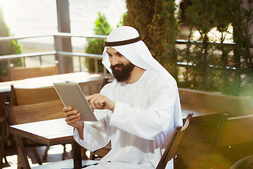 Image showing Arabian saudi businessman working outdoors