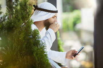 Image showing Arabian saudi businessman working outdoors