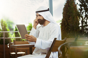 Image showing Arabian saudi businessman working outdoors