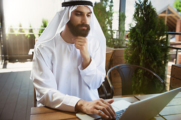 Image showing Arabian saudi businessman working outdoors