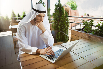 Image showing Arabian saudi businessman working outdoors