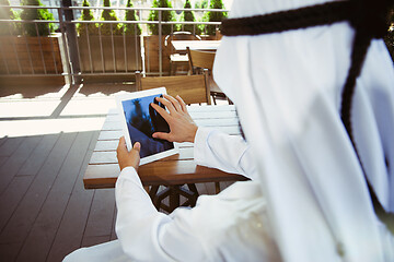 Image showing Arabian saudi businessman working outdoors