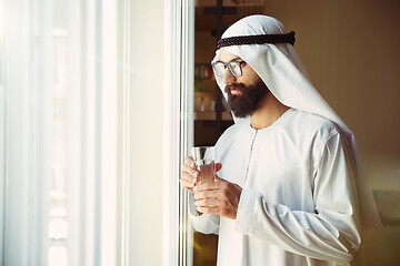 Image showing Arabian saudi businessman working in office