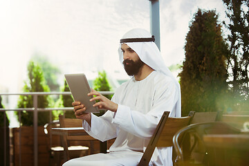 Image showing Arabian saudi businessman working outdoors