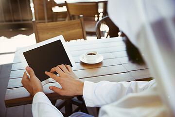 Image showing Arabian saudi businessman working outdoors