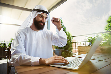 Image showing Arabian saudi businessman working outdoors