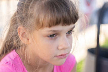 Image showing Portrait of a pensive European girl eight years old