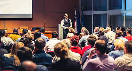 Image showing Business speaker giving a talk at business conference meeting event.