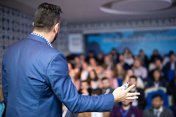 Image showing businessman giving presentations at conference room