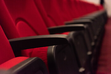 Image showing hall with rows of red seats