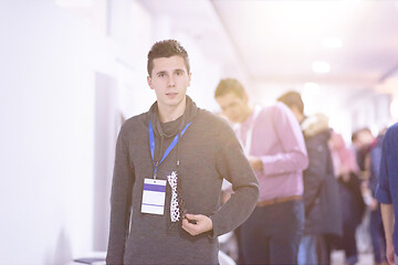 Image showing young engineer showing 3D printed model