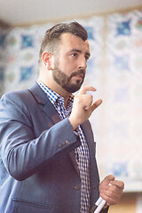 Image showing businessman giving presentations at conference room