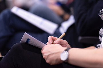 Image showing business people taking notes