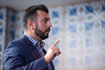 Image showing businessman giving presentations at conference room