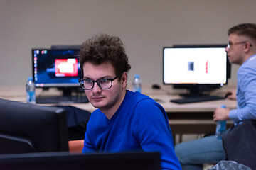 Image showing businessman working using a computer in startup office