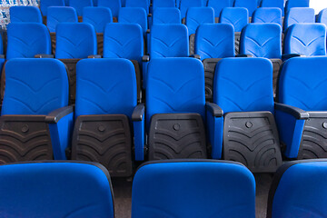 Image showing hall with rows of blue seats