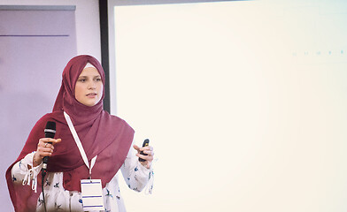 Image showing Muslim businesswoman giving presentations at conference room