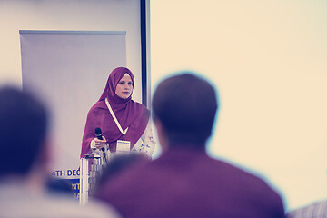 Image showing Muslim businesswoman giving presentations at conference room