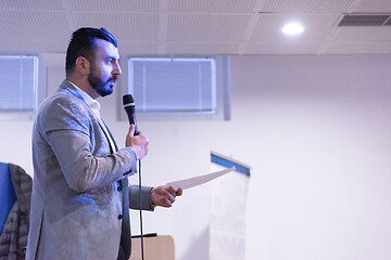 Image showing businessman giving presentations at conference room