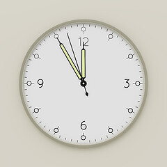 Image showing a clock shows five minutes to noon