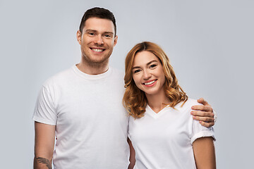 Image showing portrait of happy couple in white t-shirts
