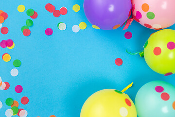 Image showing party balloons and confetti on blue background