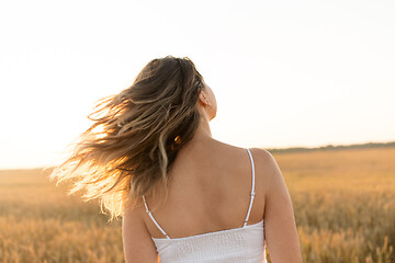 Image showing woman on cereal field in summer