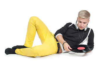 Image showing Male with headphones and vinyl isolated on white