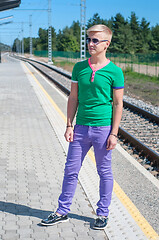 Image showing Good looking caucasian male outdoors in railway platform