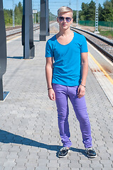 Image showing Good looking caucasian male outdoors in railway platform