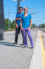 Image showing Shot of two young men standing on platform