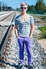 Image showing Good looking caucasian male outdoors in railway platform